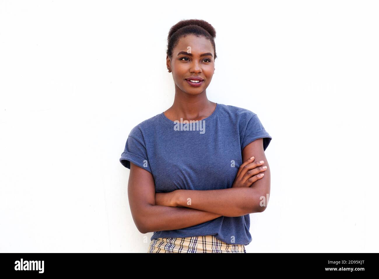 Front portrait of beautiful young woman against isolated white ...