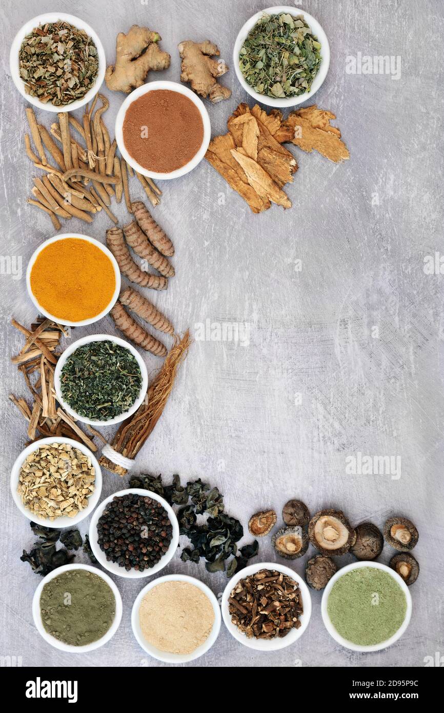 Adaptogen healthy food with herb, spices & supplement powders. Natural plant based foods that help the body deal with stress. Stock Photo