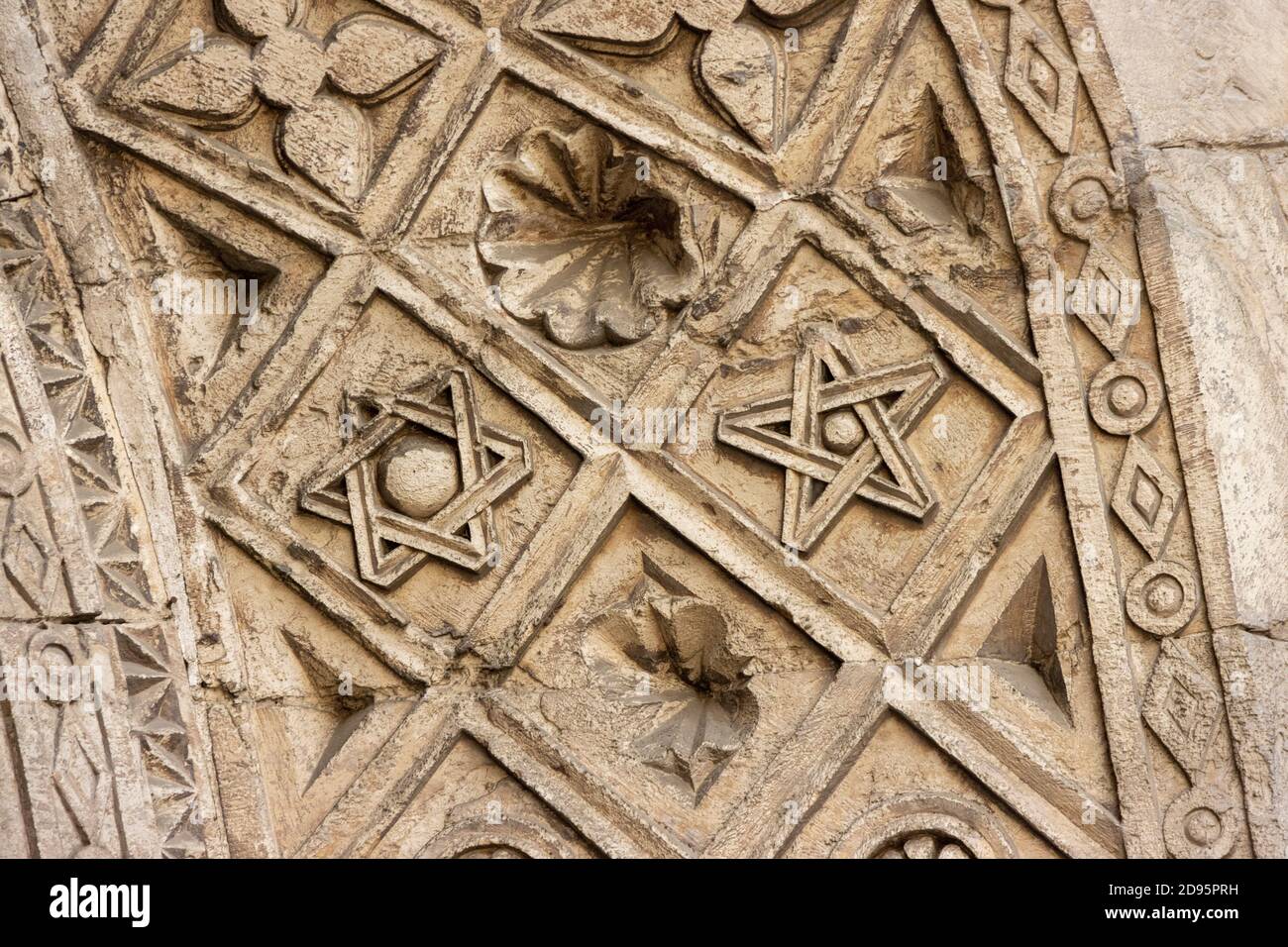 detail of carving on arch above entrance, Bab al-Futuh, Cairo, Egypt Stock Photo