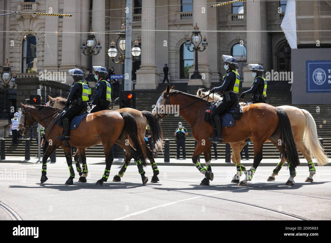 Melbourne, Australia 03 Nov 2020, police horses move along Spring Street to get into position for an expected protest in front the state parliament for another Freedom Day demonstration on Melbourne Cup Day demanding the sacking of Premier Daniel Andrews over lockdown laws. Credit: Michael Currie/Alamy Live News Stock Photo