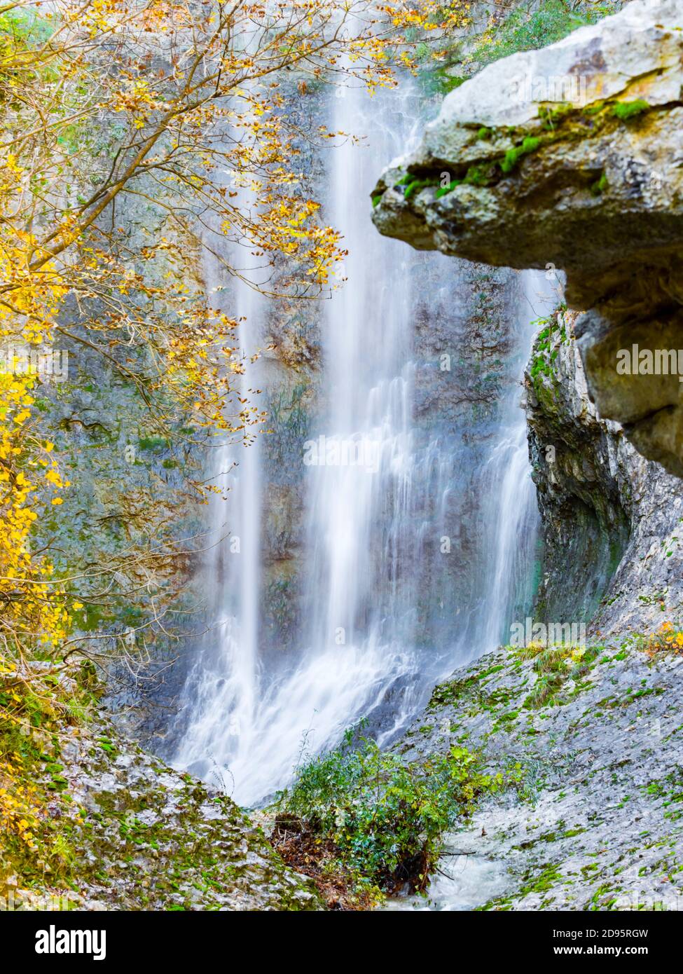 Big boulder rock balancing balance in Benkovski slap waterfall near Pican in Croatia Europe focus on background water Stock Photo