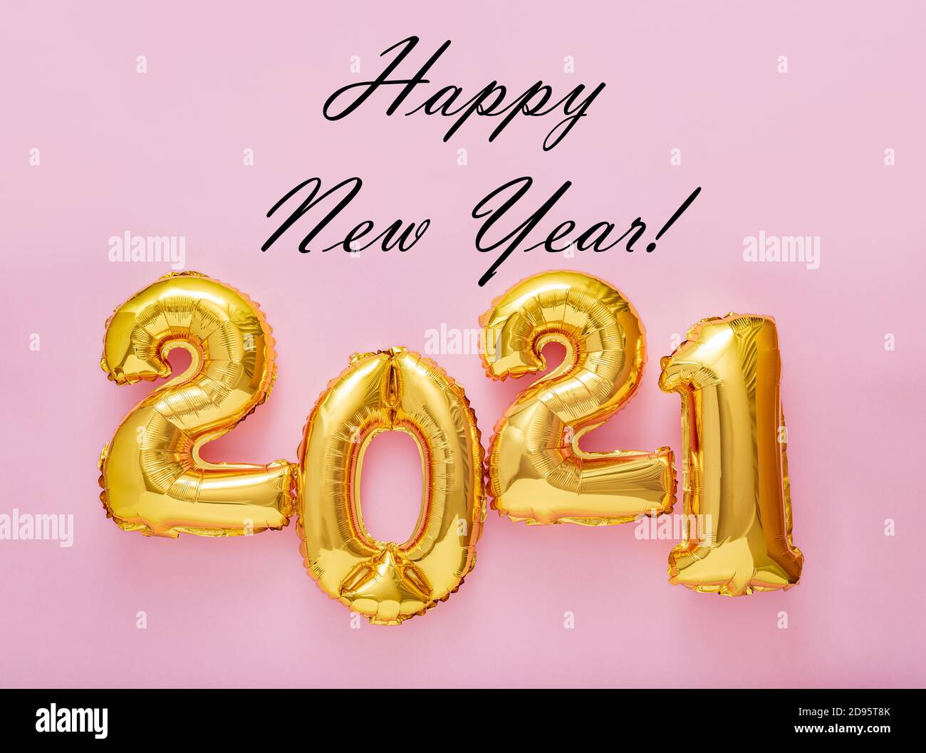 Happy New year black text with gold foil balloons 2021 on pink background. New Year eve invitation 2021 card. Square flat lay Stock Photo