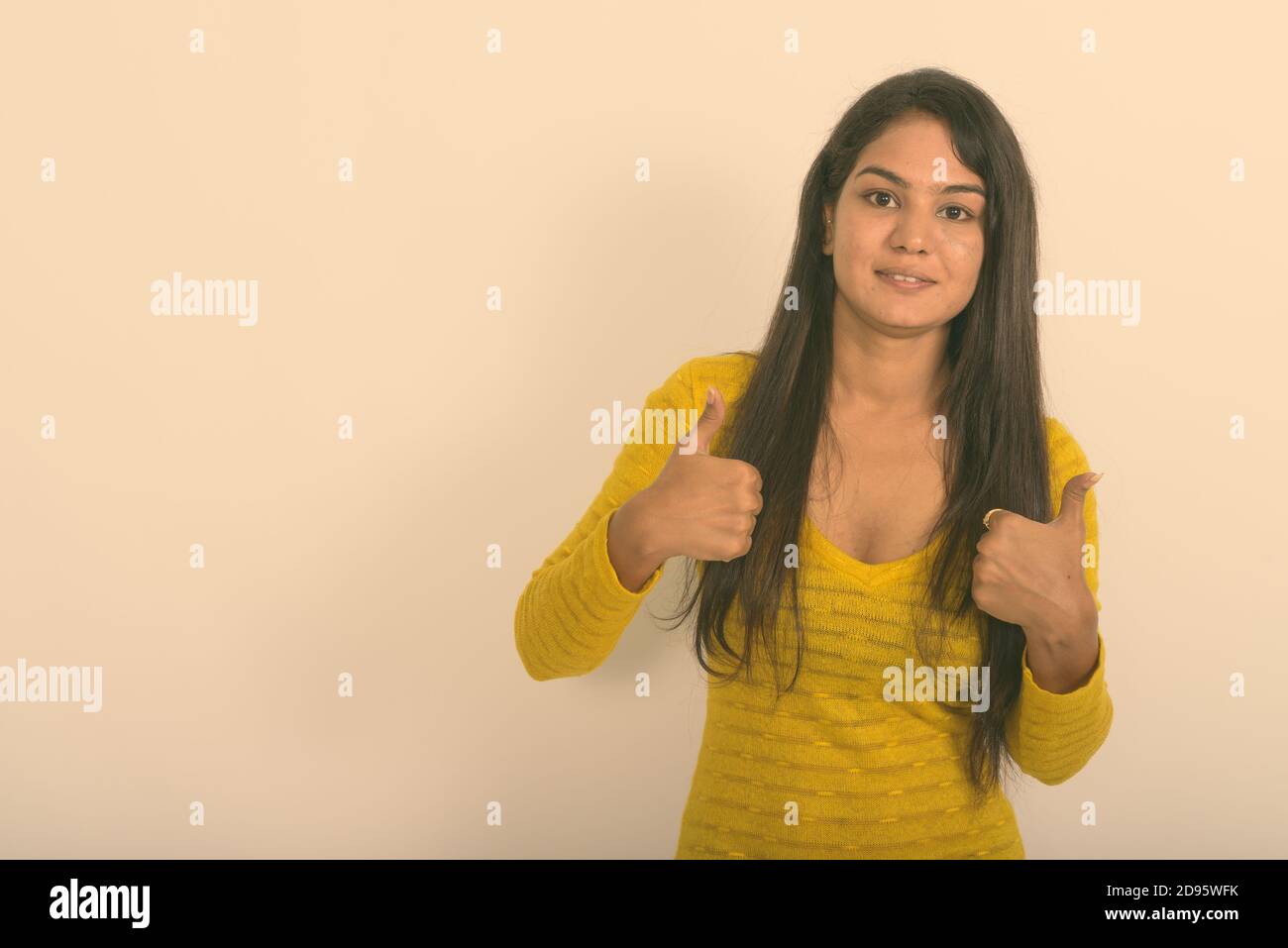 Indian adult woman thumbs up hi-res stock photography and images - Alamy