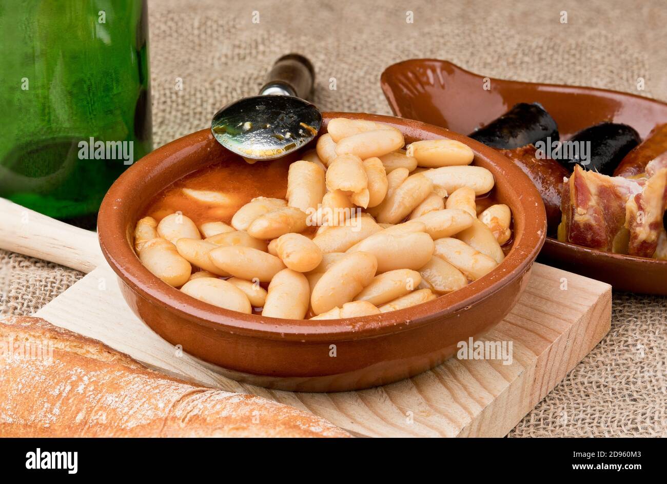 Asturian fabada, or simply fabada, is the traditional dish of Asturian cuisine made with Asturian faba (in Asturian, fabes), sausages such as chorizo Stock Photo
