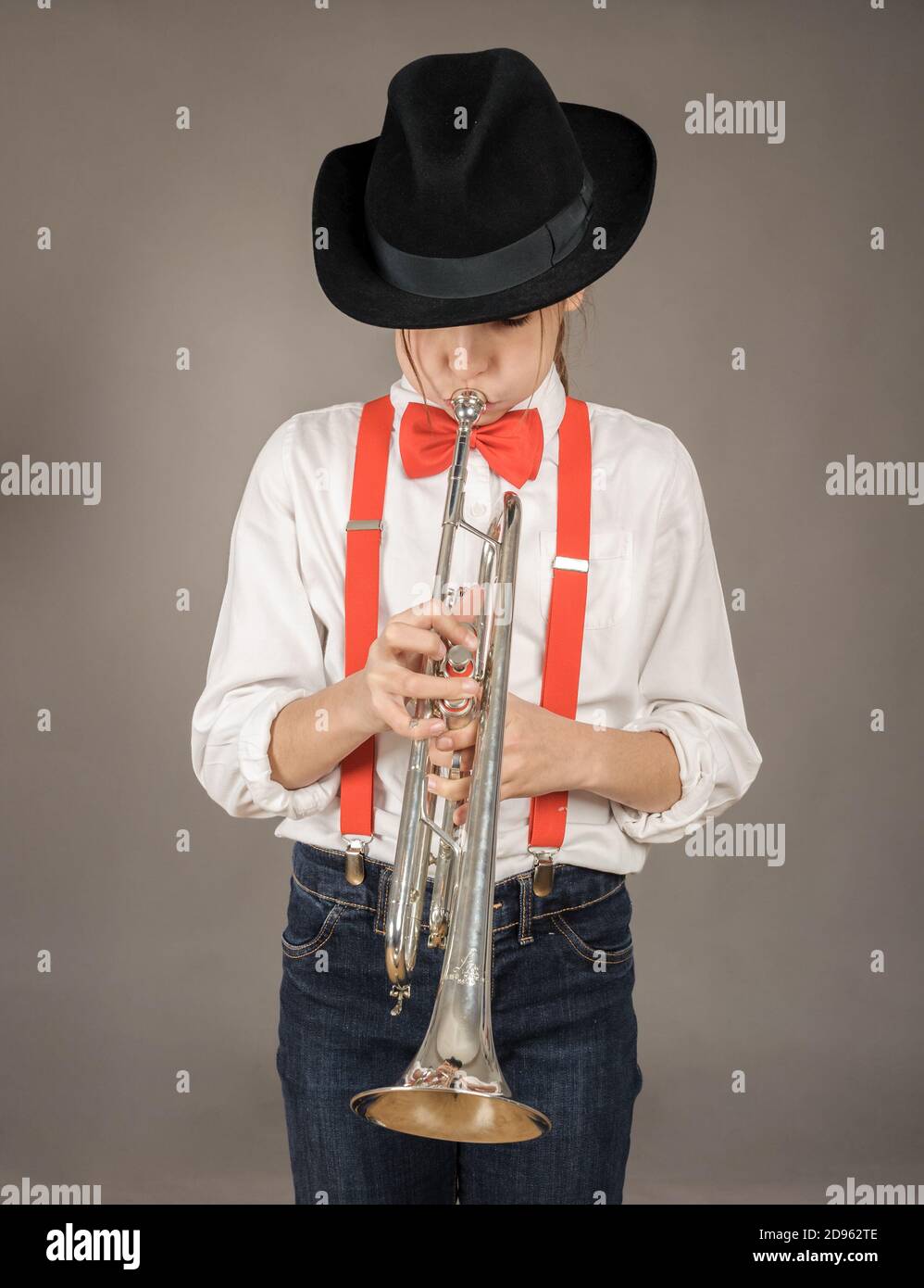 Girl playing cornet hi-res stock photography and images - Alamy