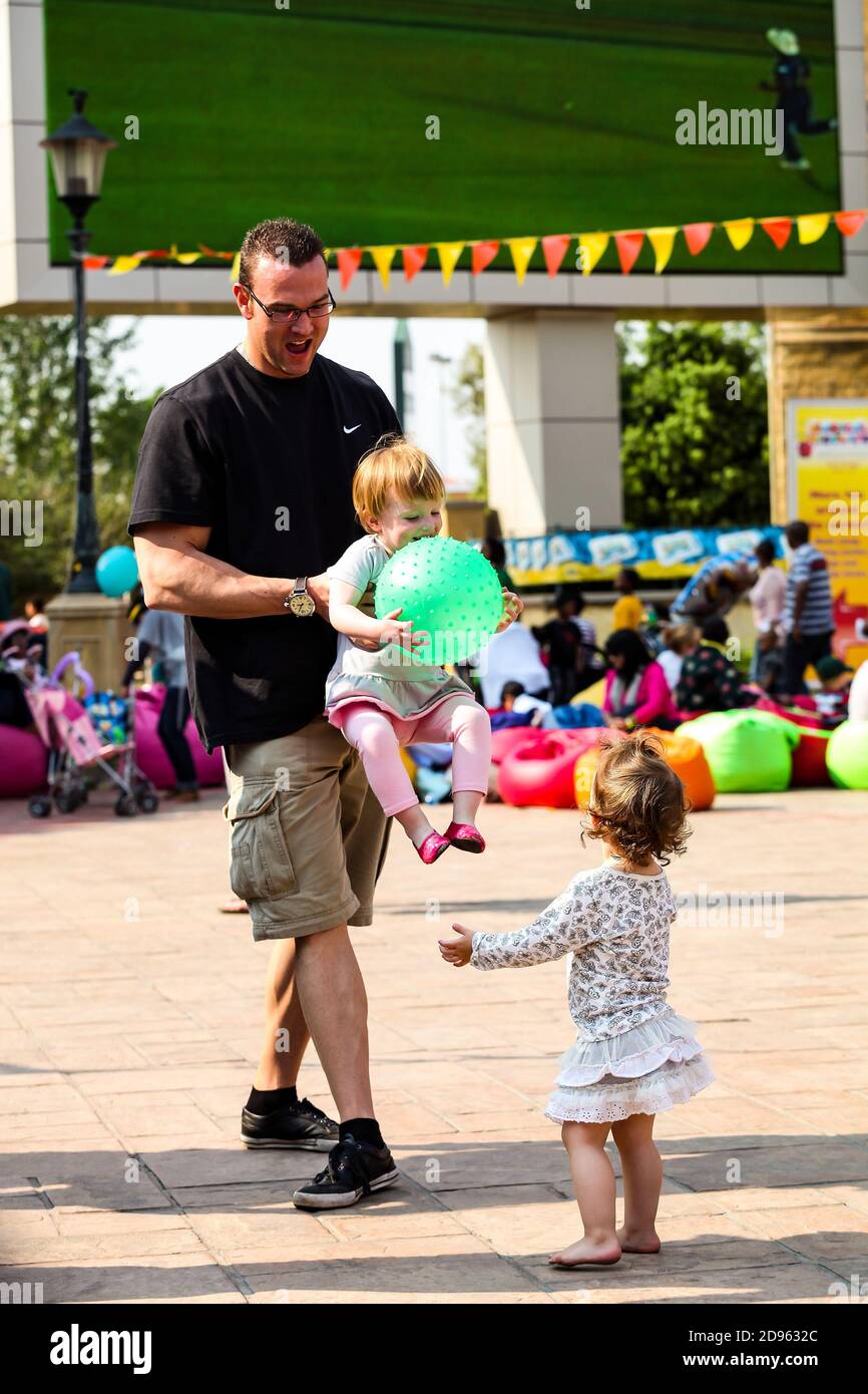Johannesburg, South Africa September 22, 2012 Father and daughter Family fun at outdoor