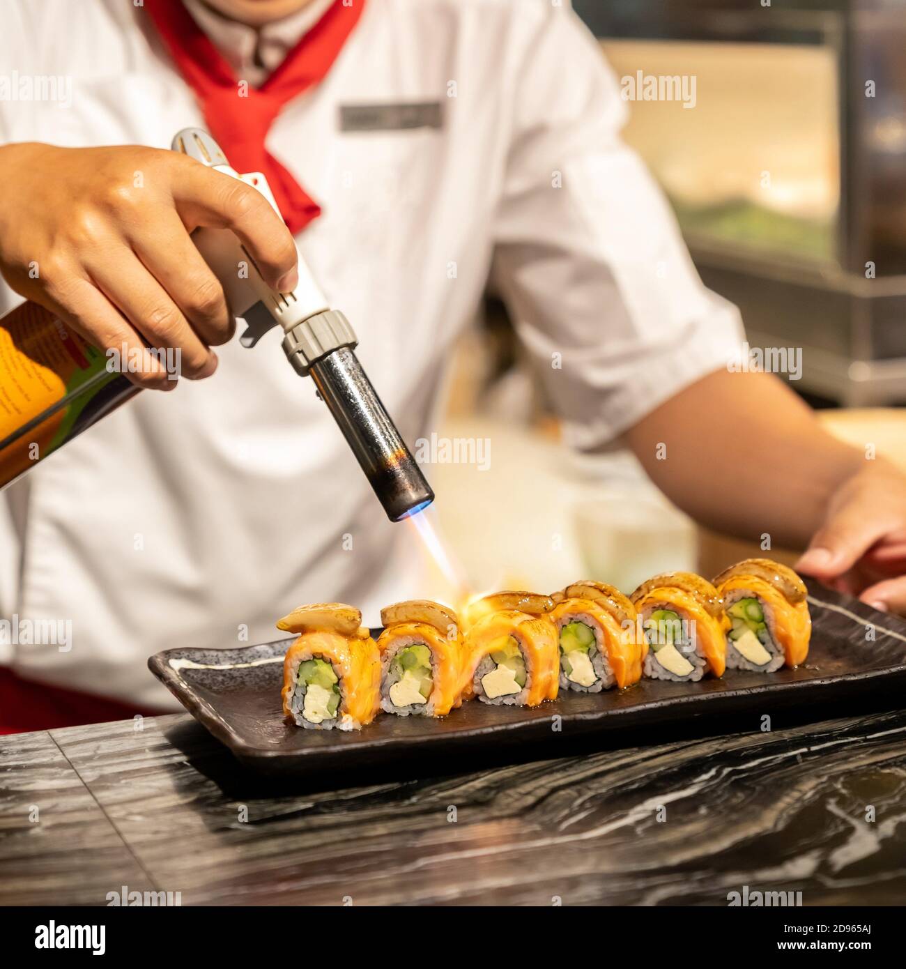 Chef cooking Salmon Foie gras roll, Fusion Japanese Cuisine food, using