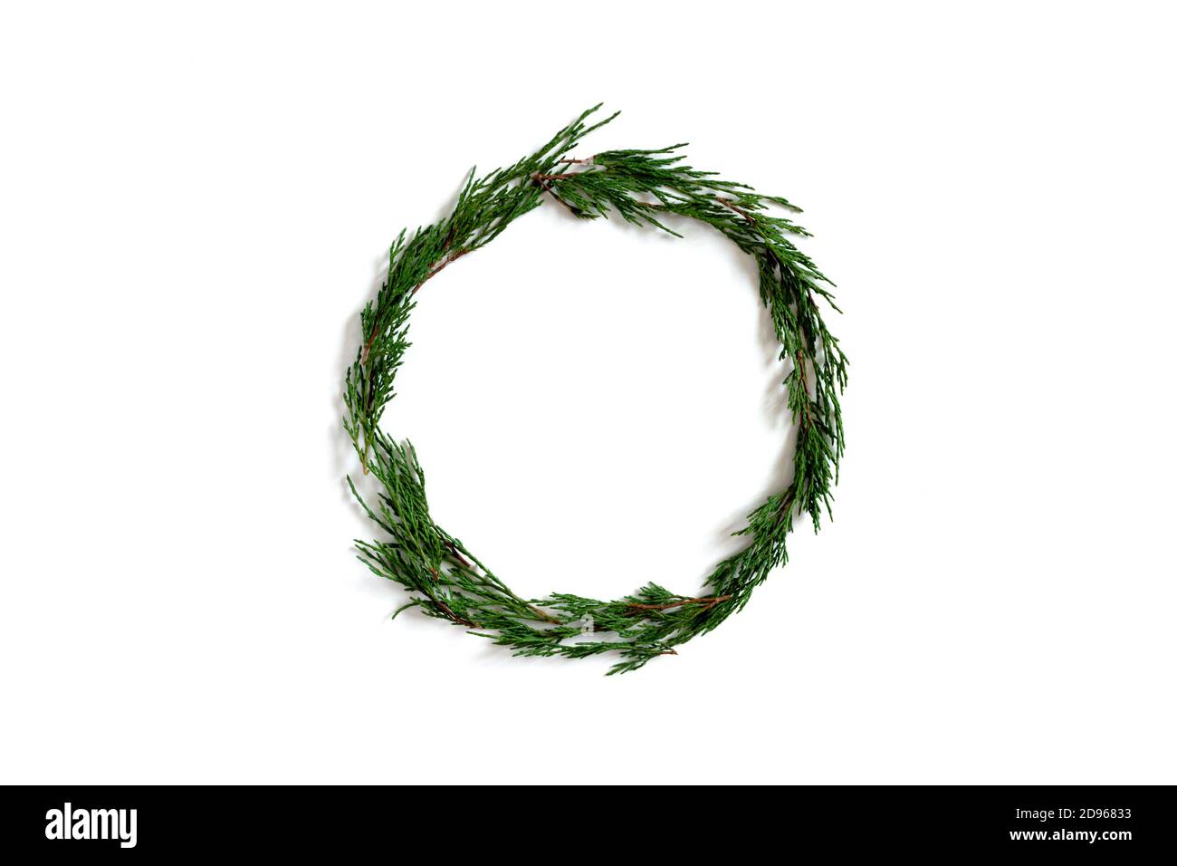 Wreath made from conifer tree branches on a white background Stock Photo