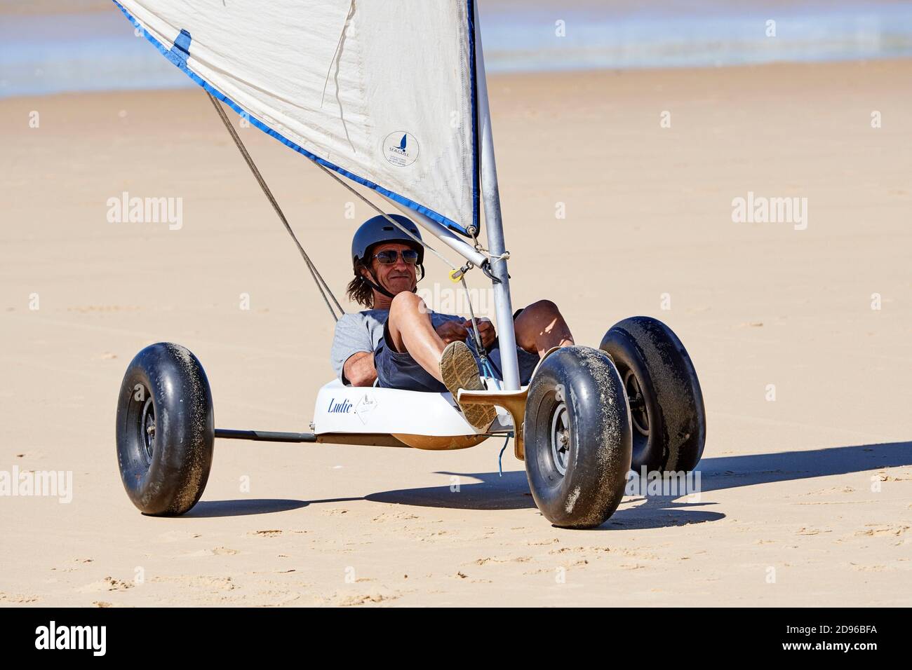 Land sailing / sand yachting / land yachting on the beach at Mimizan, Aquitaine, France. Stock Photo
