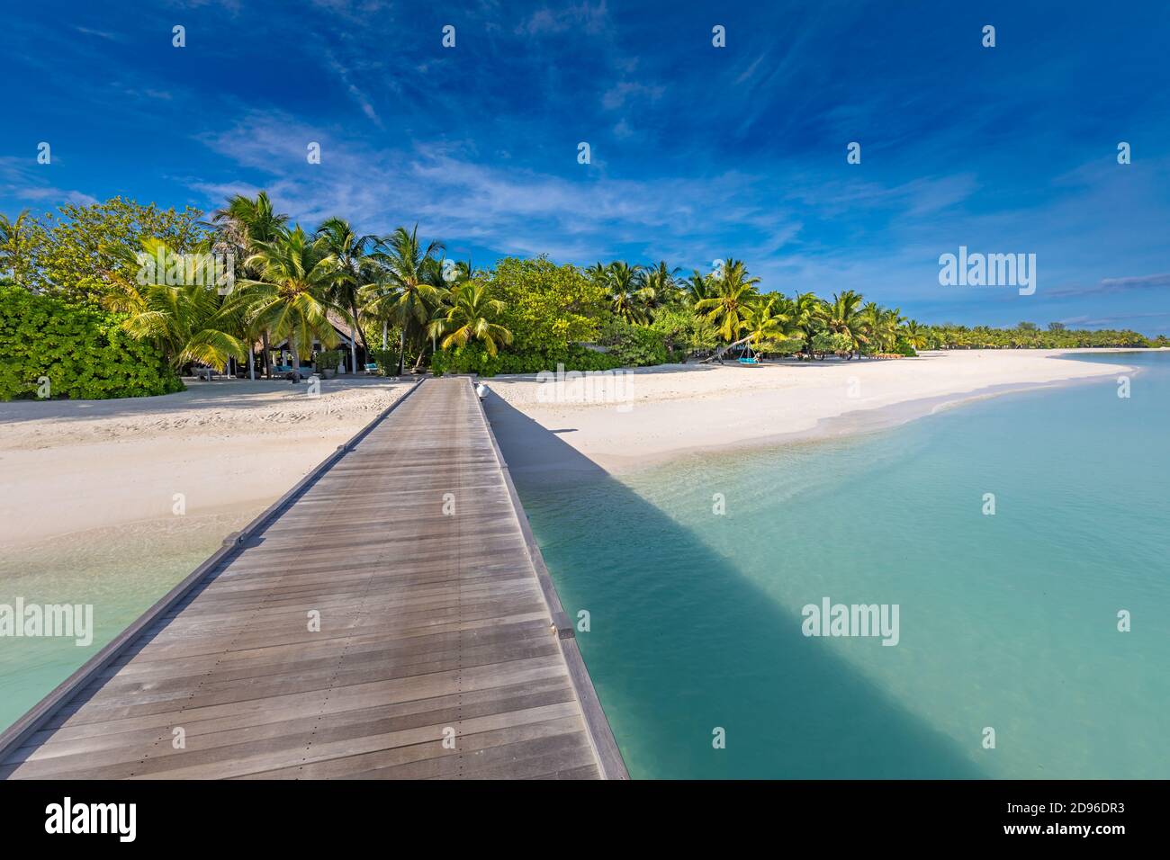 Beautiful beach in Maldives. Long jetty vacations and tourism concept. Tropical resort beach landscape, paradise island, travel concept Stock Photo