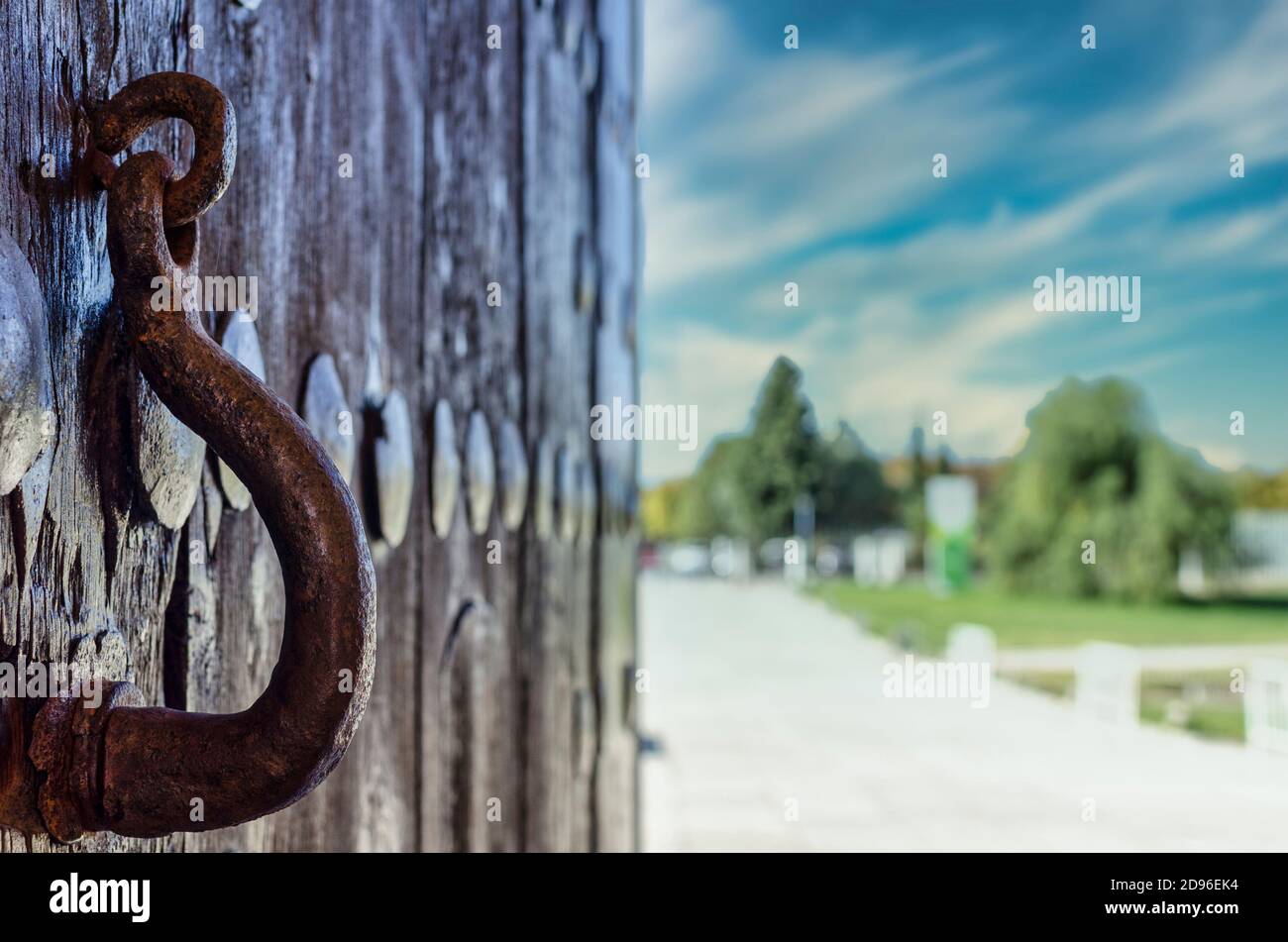 Selective focus and closeup of an old wooden door in Seville, Spain. Stock Photo