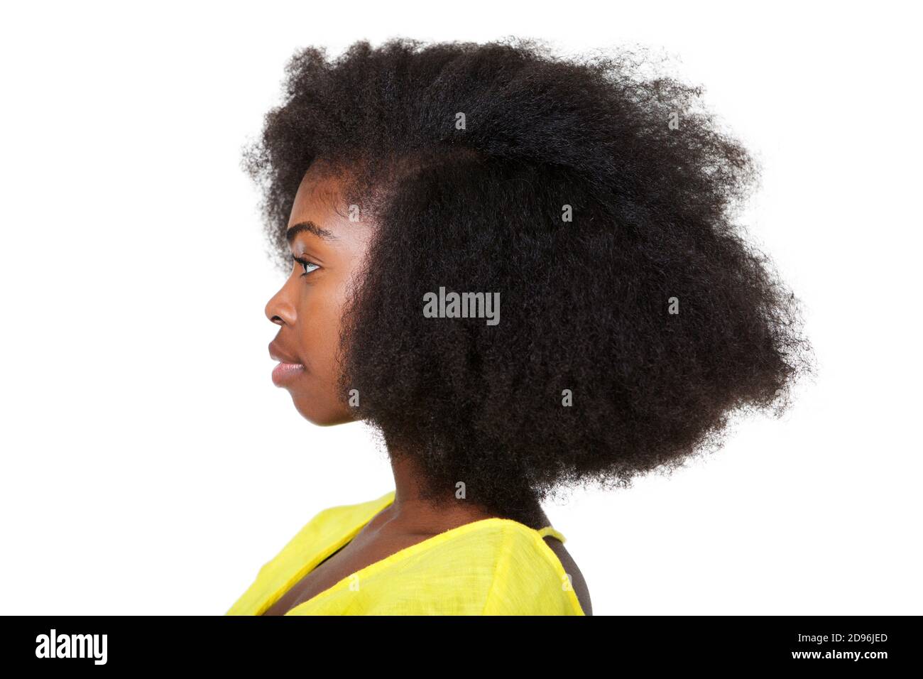 Close up profile portrait of attractive young black woman with afro ...