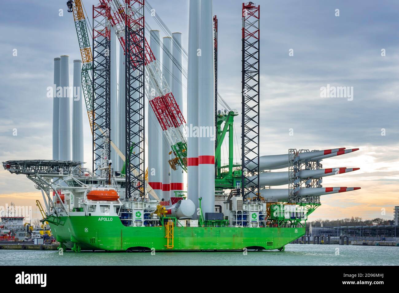 Installation vessel Apollo moored at REBO heavy load terminal in Ostend port, Belgium loading 2 sets of wind turbines for offshore SeaMade wind farm Stock Photo