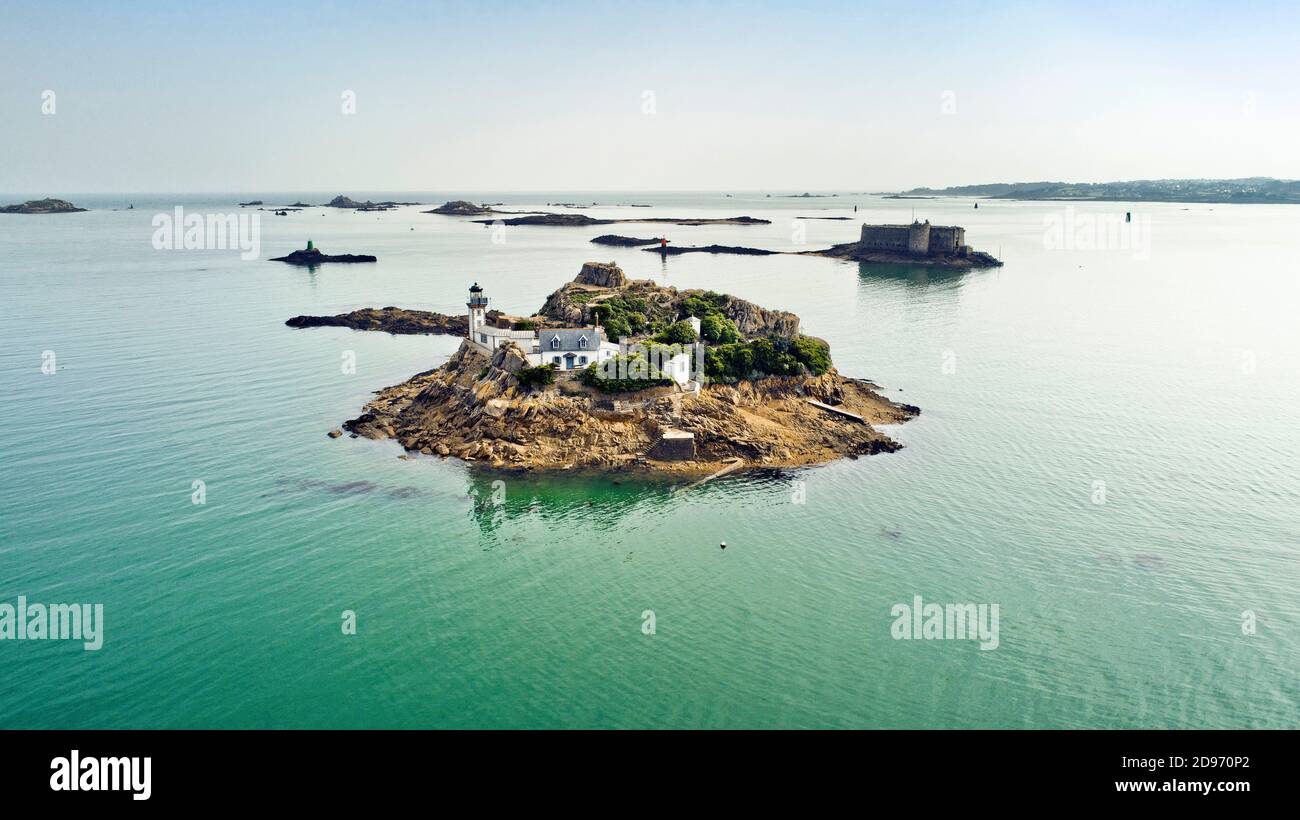 Aerial view of Louet Island in the Bay of Morlaix, Carantec (Brittany, north-western France) with the lighthouse, the keeper’s house and the “Chateau Stock Photo