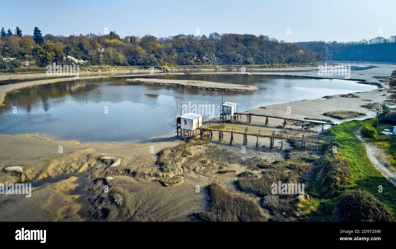 La Vicomte-sur-Rance (Brittany, north-western France): aerial view of the pontoons with huts and square fishing nets on the River Rance Stock Photo