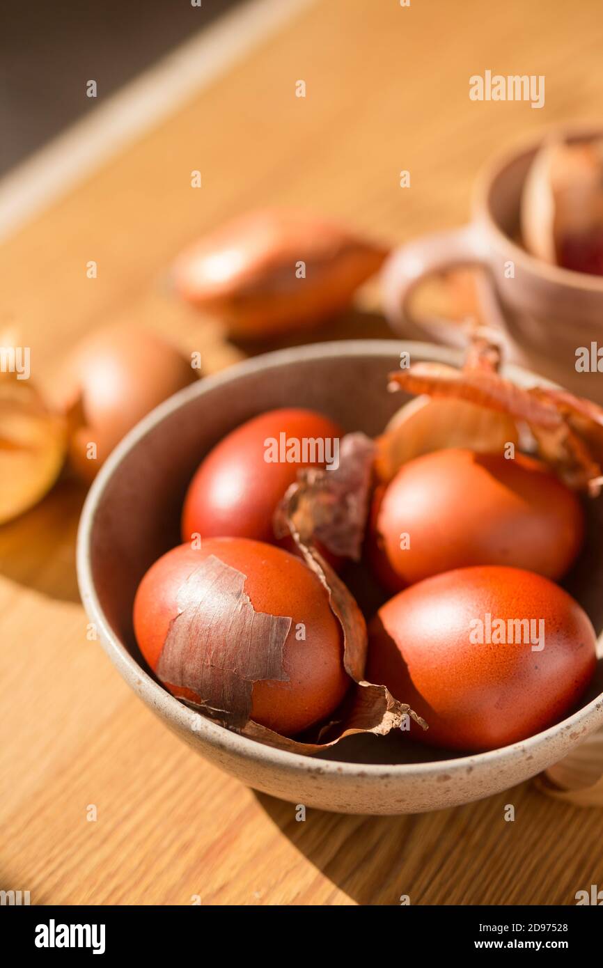 Easter egg colored with natural dye - onion skins. Polish Easter tradition Stock Photo