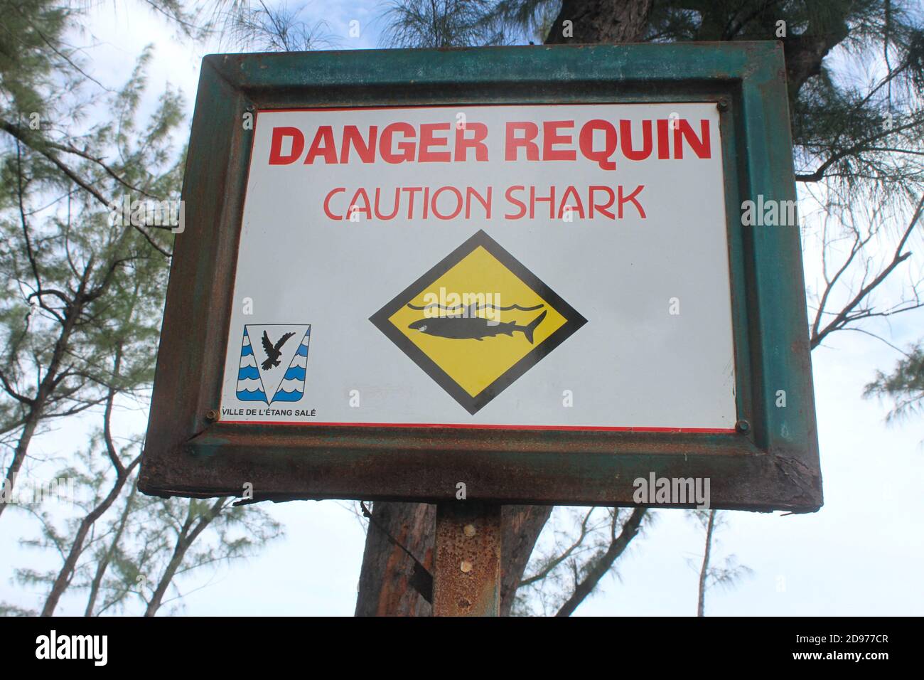 Warning sign against sharks in Reunion. Stock Photo