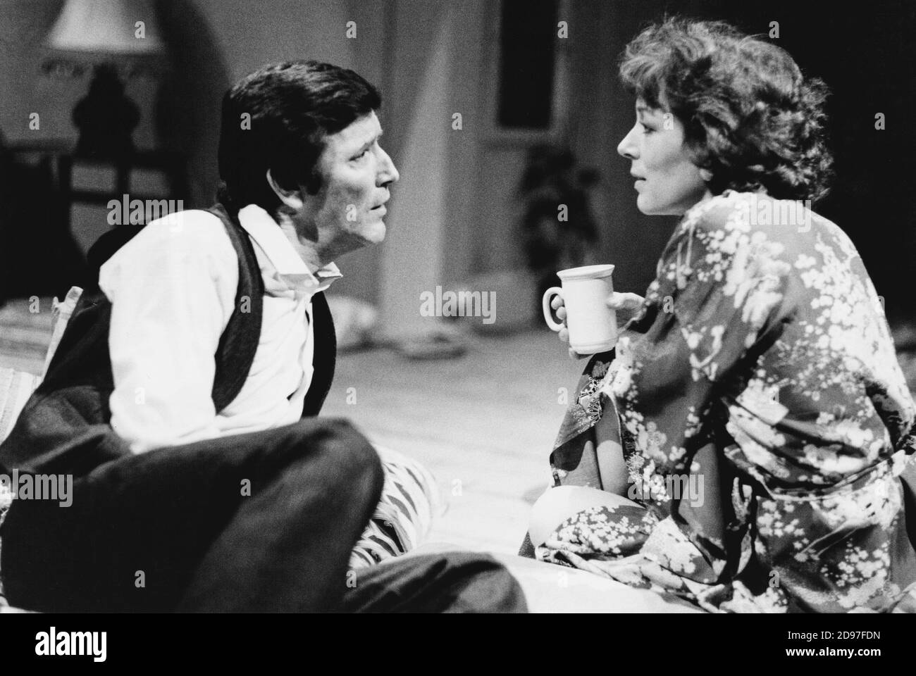Tom Bell (Tom Fearon), Lynn Farleigh (Mary Fearon) in THE MAN WHO FELL IN LOVE WITH HIS WIFE by Ted Whitehead at the Lyric Hammersmith Studio, London W6  02/1984  design: Poppy Mitchell  lighting: Dave Horn  director: Peter James Stock Photo