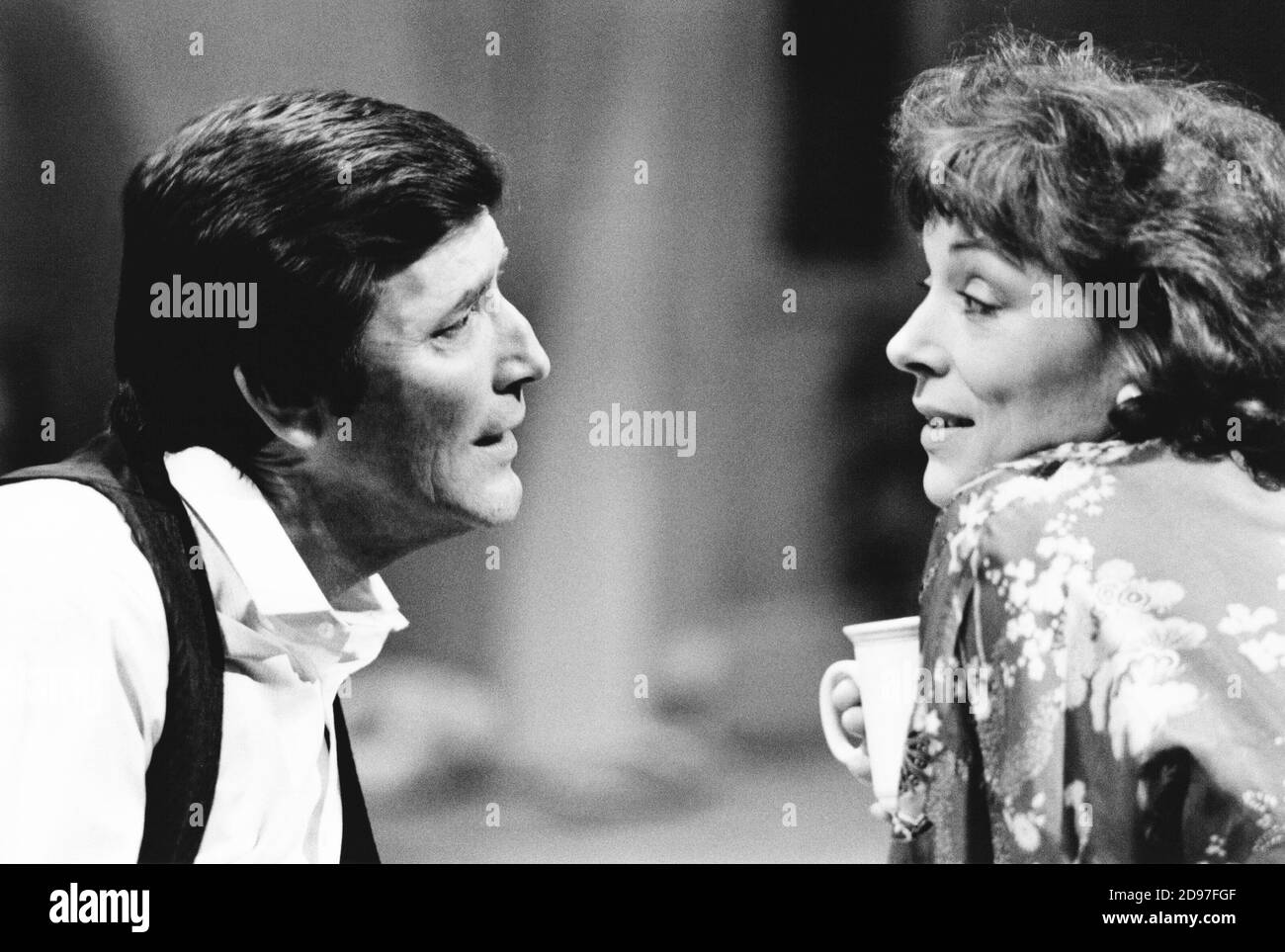 Tom Bell (Tom Fearon), Lynn Farleigh (Mary Fearon) in THE MAN WHO FELL IN LOVE WITH HIS WIFE by Ted Whitehead at the Lyric Hammersmith Studio, London W6  02/1984  design: Poppy Mitchell  lighting: Dave Horn  director: Peter James Stock Photo