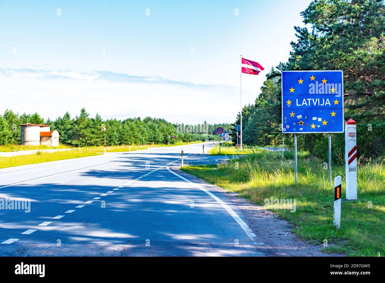 Latvian border with flag waving in the sky, Baltic countries, European Union, Baltic bubble Stock Photo