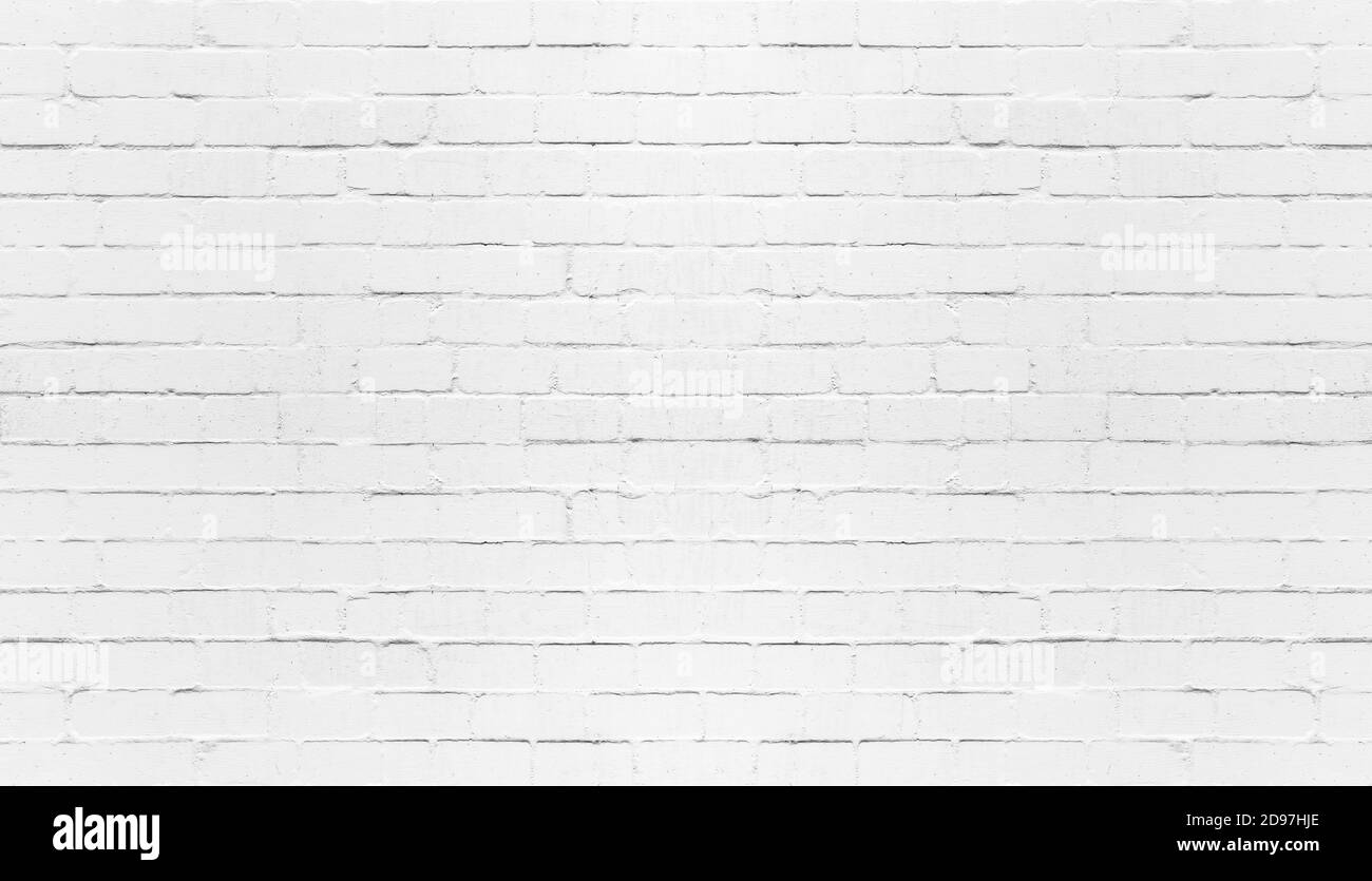 white painted brick wall full frame wide background Stock Photo