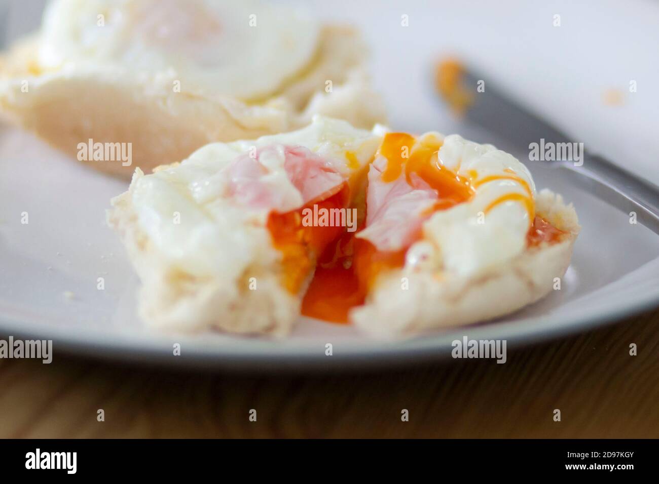 Poached eggs on test Stock Photo