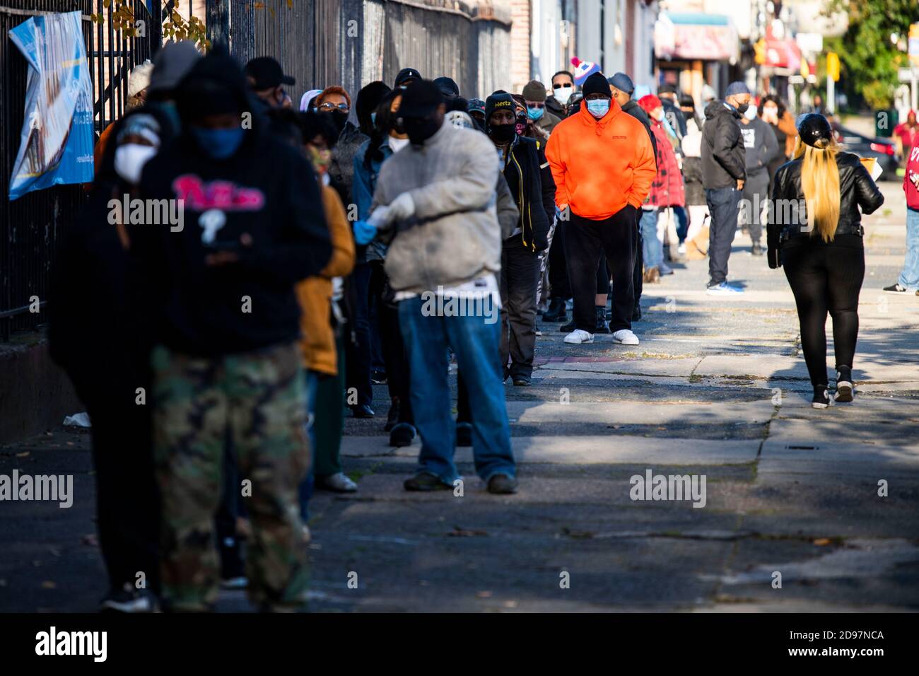 Philadelphia, USA. 3rd November, 2020. A man who did not wish to be identified waits in line to vote at a polling location at the Happy Hollow Recreational Center in Germantown, Philadelphia. Credit: Christopher Evens/Alamy Live News Stock Photo