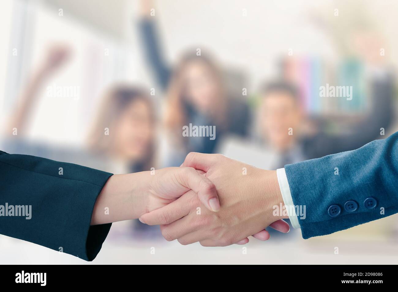 Business handshake with partnership on blurred business people successful concept coworkers handshaking process.Successful deal after great meeting Stock Photo