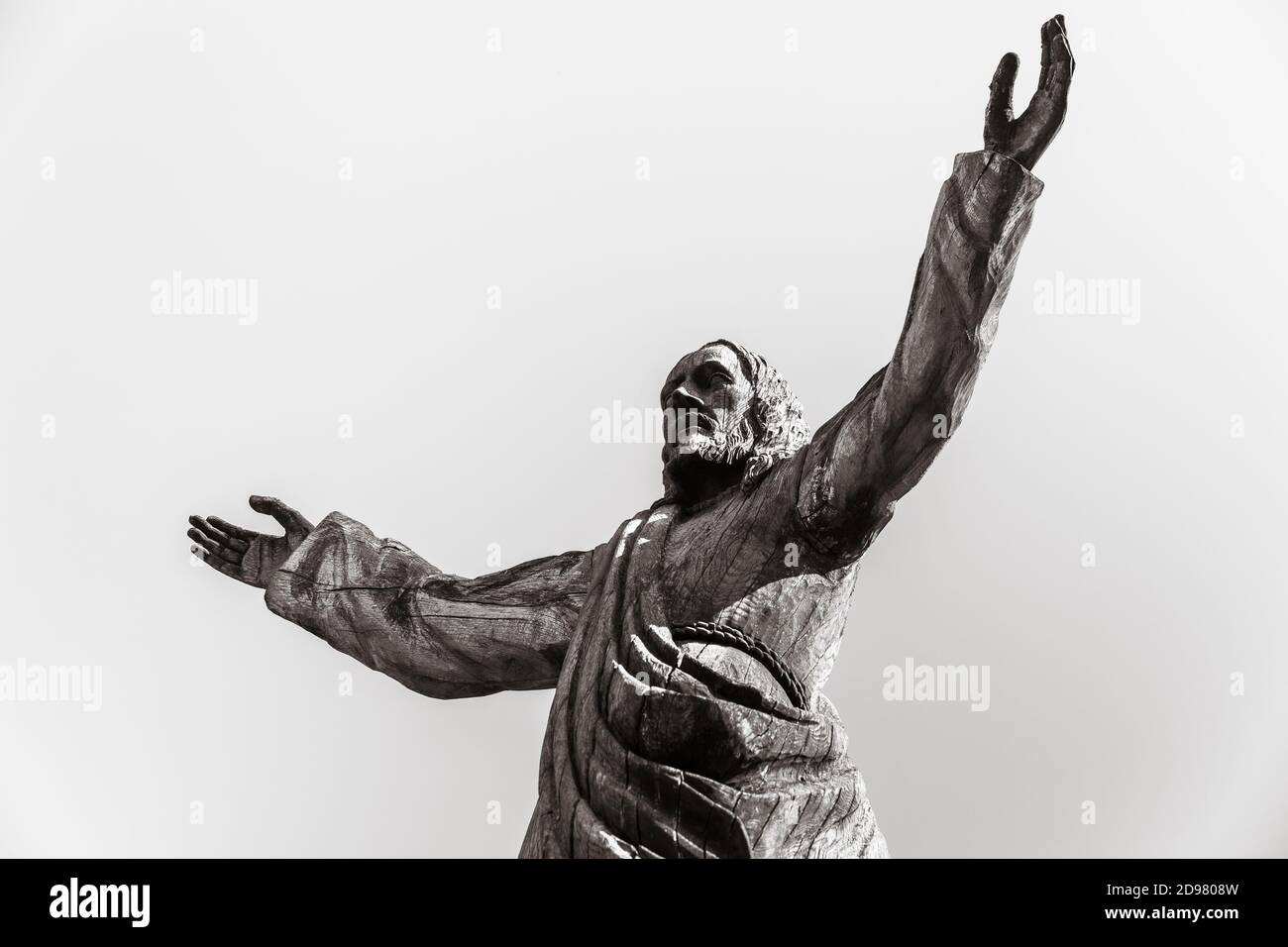 Black and white image of wooden statue of Jesus Christ at the Hill of ...