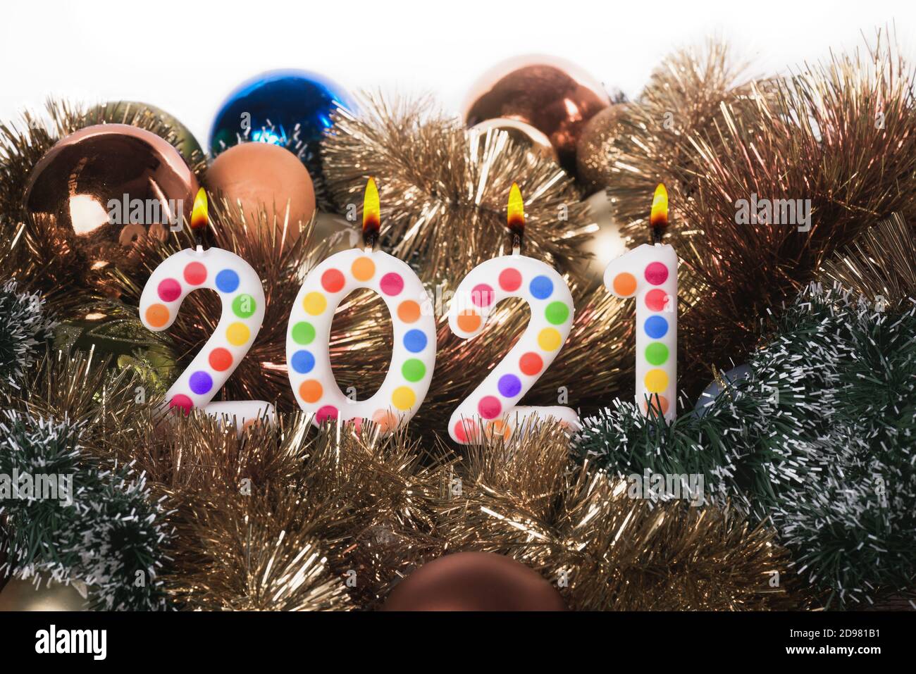 Four colorful candles write numbers flame Happy new year 2021 Stock ...