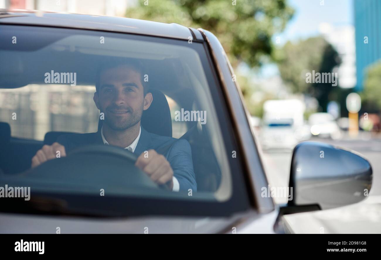 Car driving through city hi-res stock photography and images - Alamy