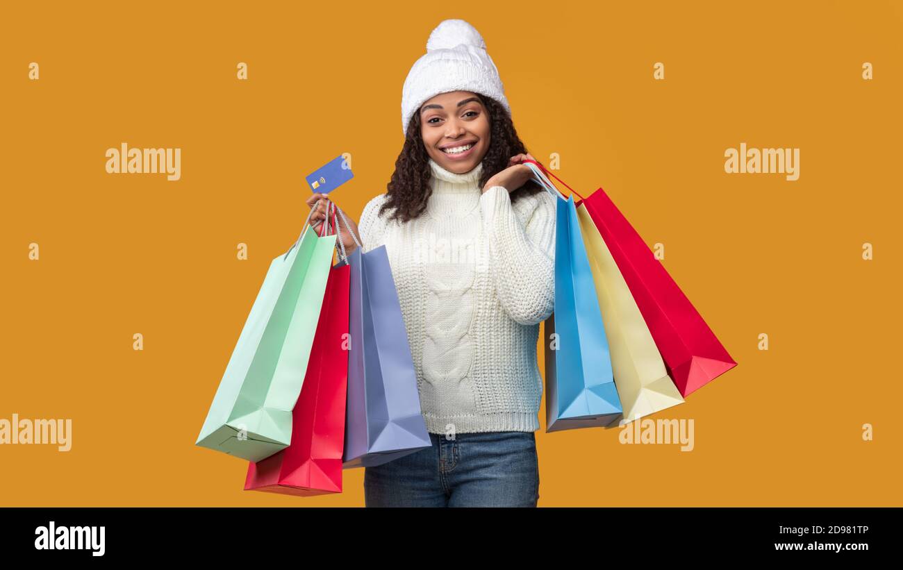Smiling black lady in a hat hi-res stock photography and images - Alamy