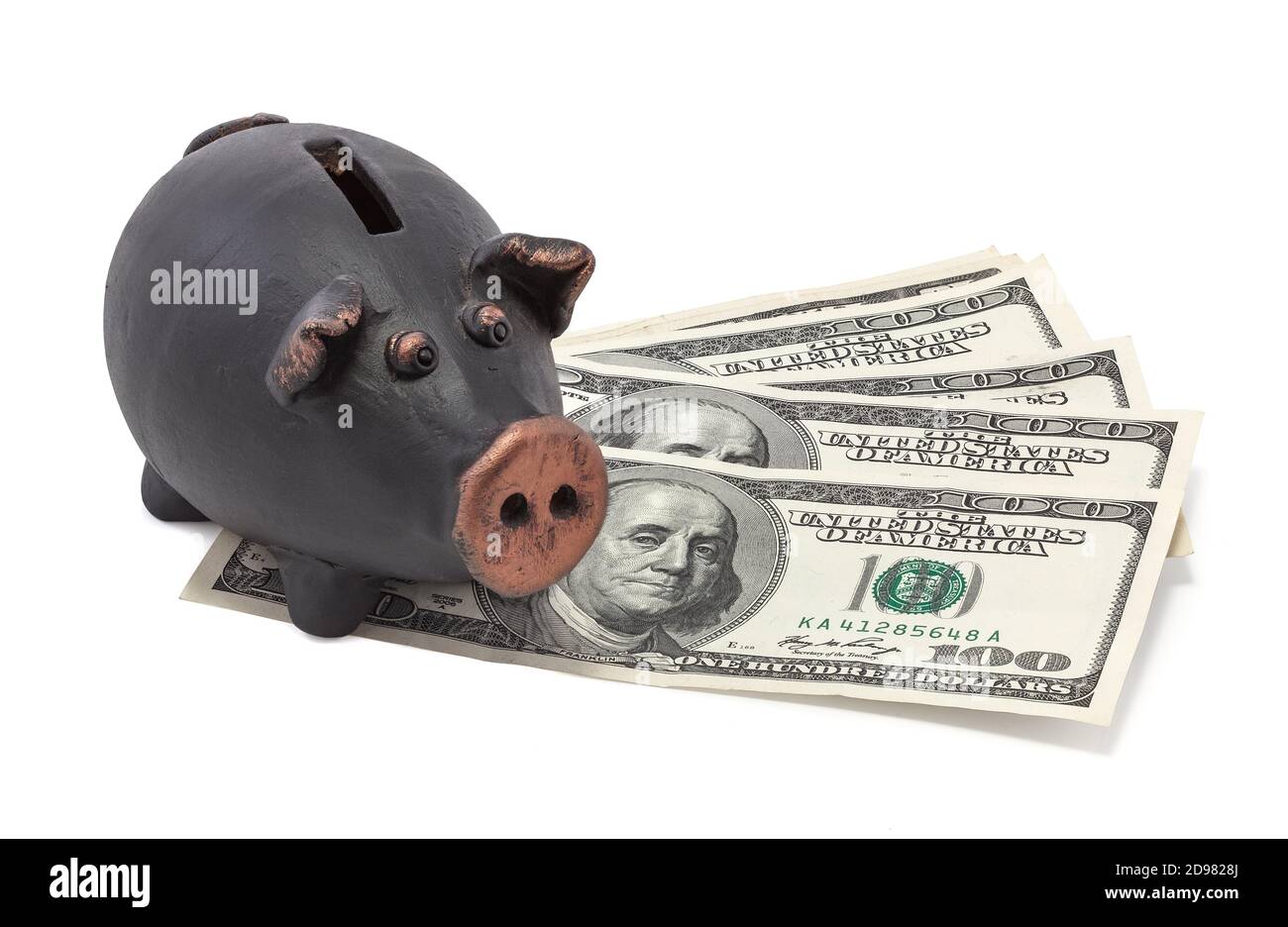 Money and black piggy bank on white background Stock Photo - Alamy