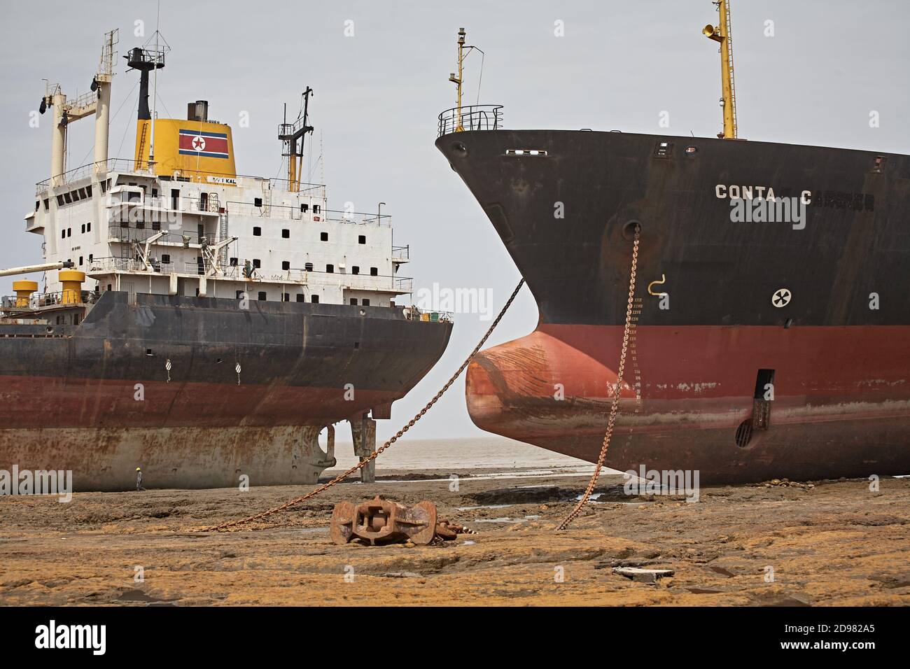 Alang, India, September 2008. Large tonnage cargo ships stranded on the beach waiting to be scrapped. Stock Photo