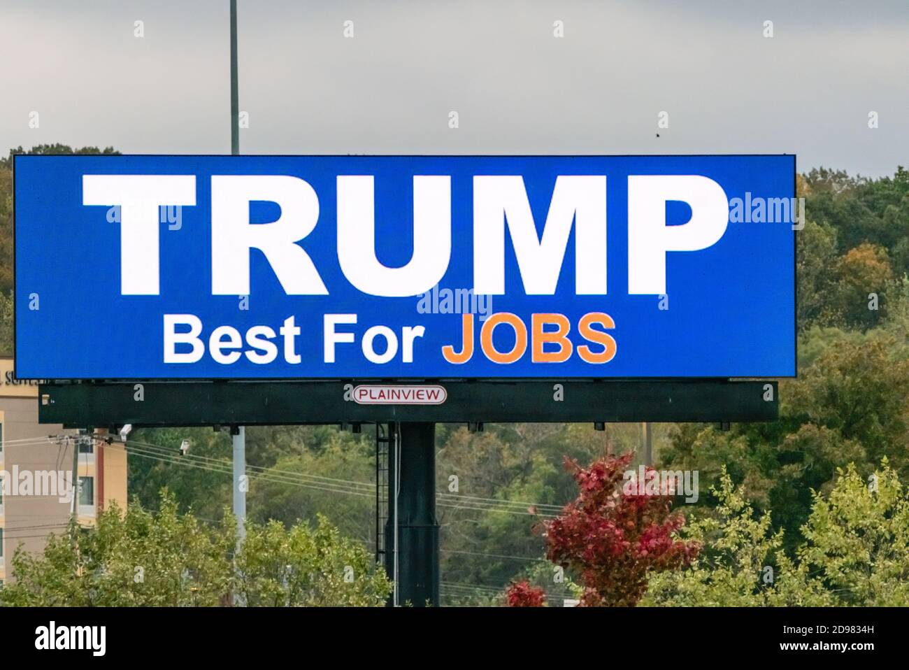 large Trump billboard along the side of the expressway. Mentioning jobs. Stock Photo