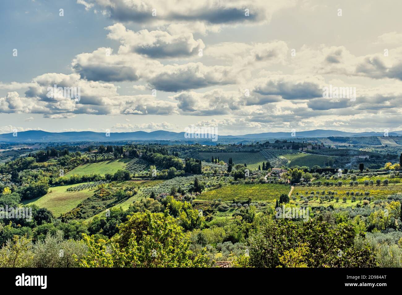 Tuscany scenic landscape and cloudscape summer panorama. Stock Photo