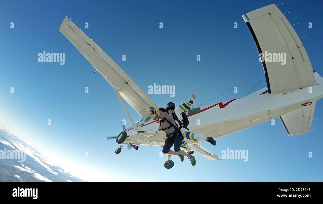 Sky diving tandem friends clear sky Stock Photo