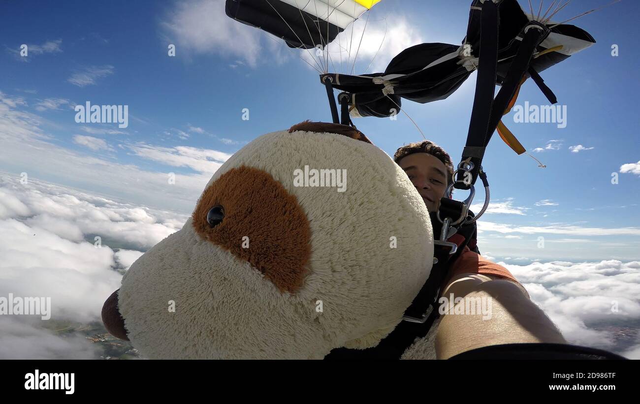 Skydiving Teddy Bear extreme sports Stock Photo