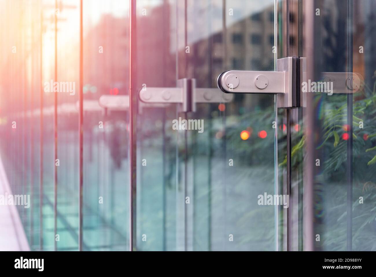 Modern abstract city reflection in building glass. Stock Photo