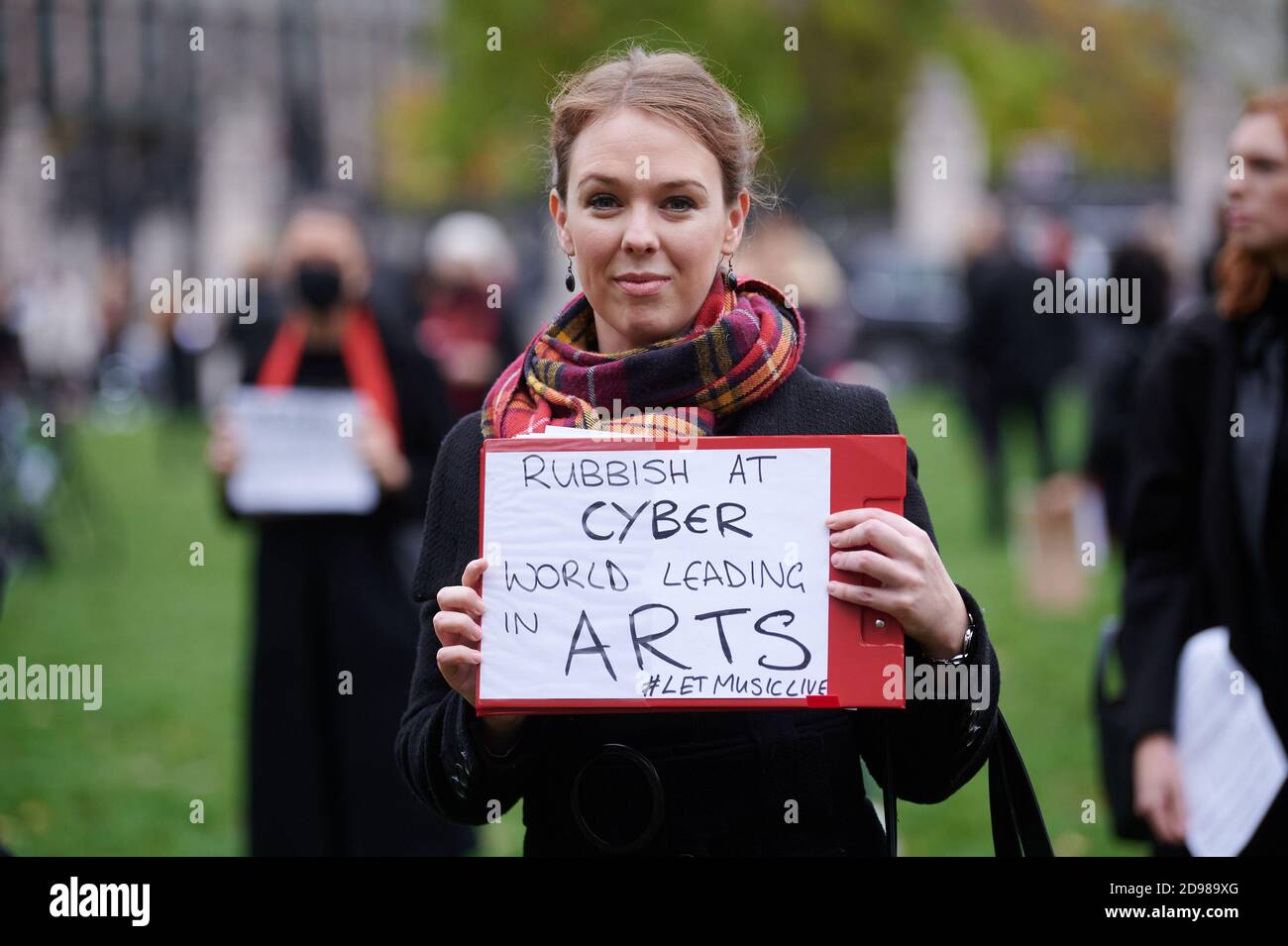 150 professional opera singers perform Verdi in Parliament Square to call for targeted support for colleagues in the arts and entertainment sector. Lo Stock Photo