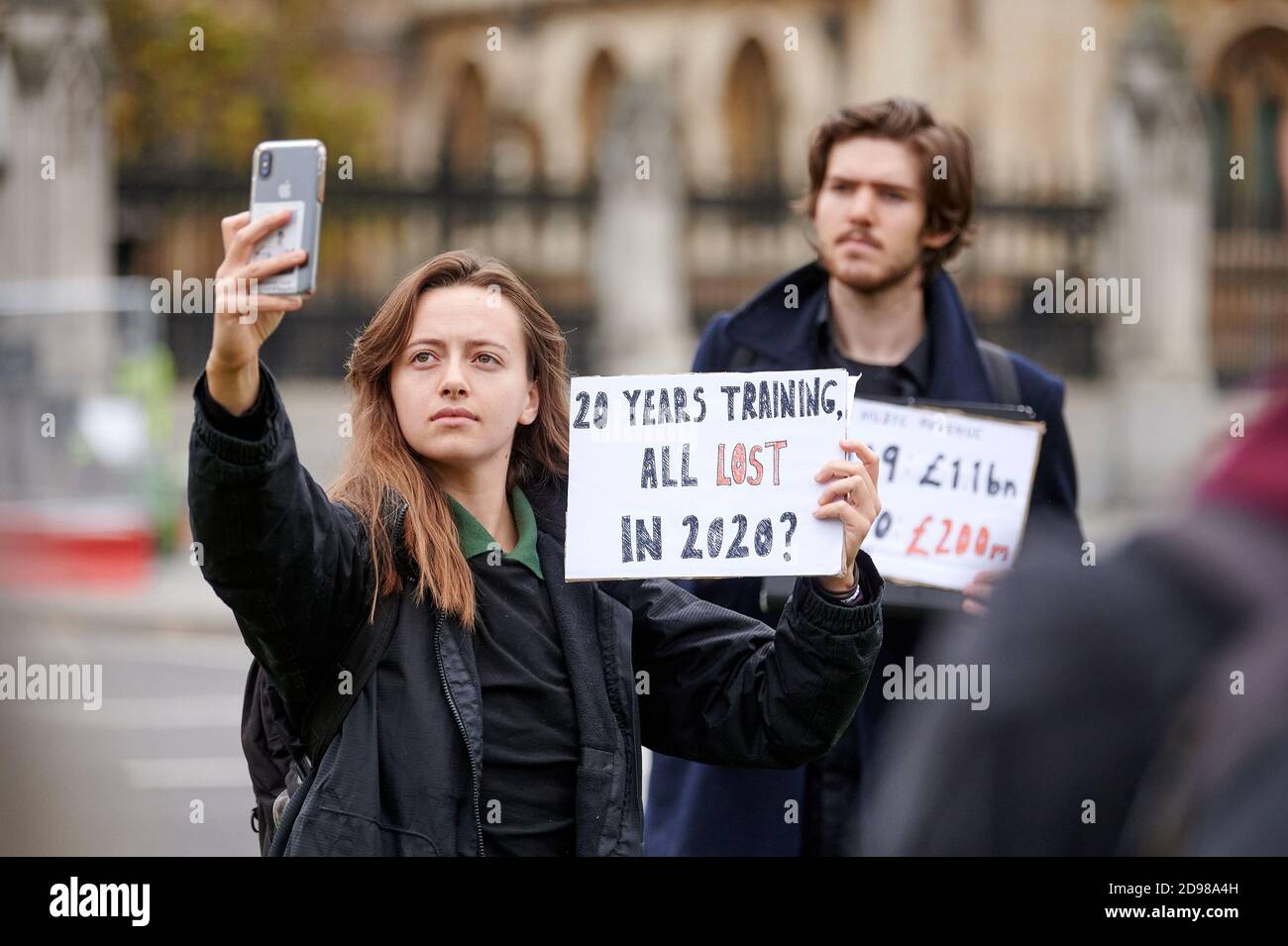150 professional opera singers perform Verdi in Parliament Square to call for targeted support for colleagues in the arts and entertainment sector. Lo Stock Photo