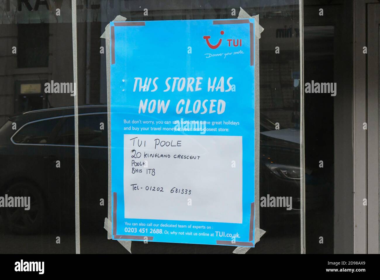 Dorchester, Dorset, UK.  3rd November 2020.   A closed sign in the window of an empty shop which was a TUI travel agents in South Street at Dorchester in Dorset which shut during the Covid-19 pandemic.  Picture Credit: Graham Hunt/Alamy Live News Stock Photo