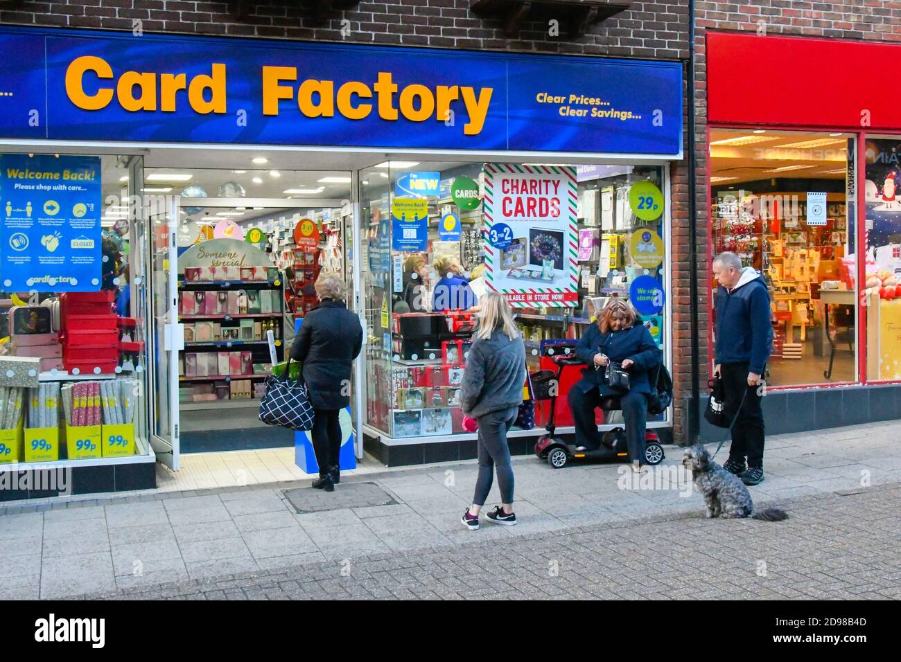 Dorchester, Dorset, UK.  3rd November 2020.  Shoppers queuing to enter the Card Factory in South Street at Dorchester in Dorset before it has to close on Thursday as a non-essential retailer during the new Covid-19 lockdown.  Picture Credit: Graham Hunt/Alamy Live News Stock Photo