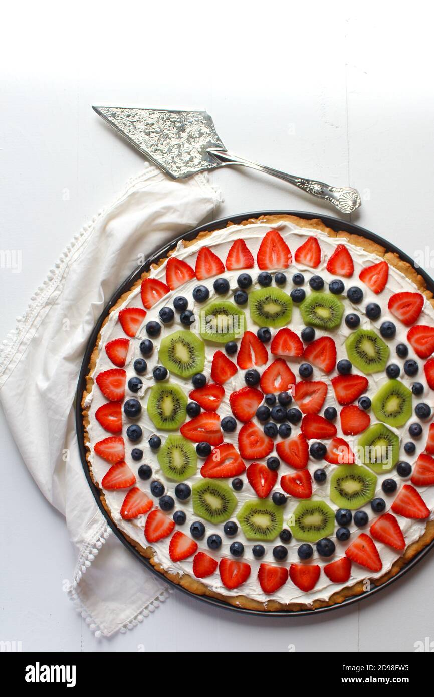 Fresh fruit dessert pizza with buttercream frosting Stock Photo Alamy