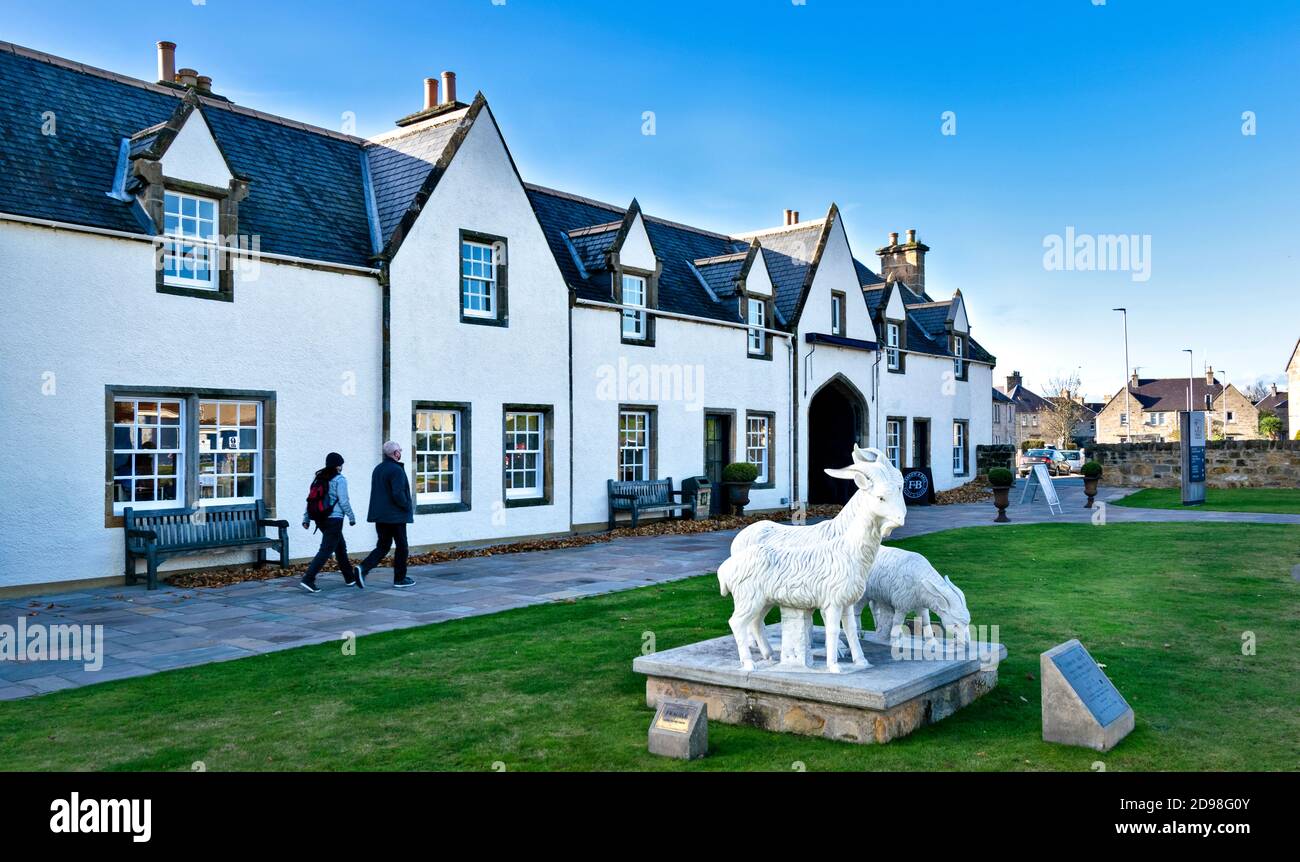 JOHNSTONS OF ELGIN MORAY SCOTLAND CASHMERE AND WOOL MILL OUTER BUILDINGS AND CASHMERE GOAT SCULPTURE Stock Photo