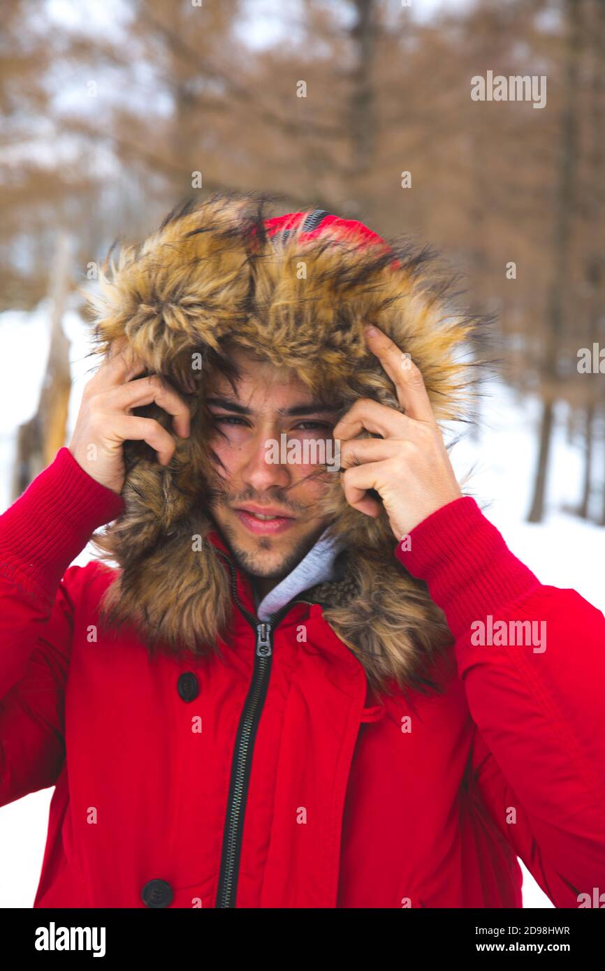 Young adult walking at the snowy mountain Stock Photo Alamy