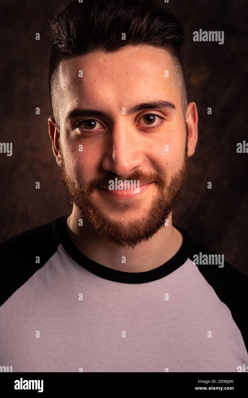 Handsome man posing at a studio Stock Photo