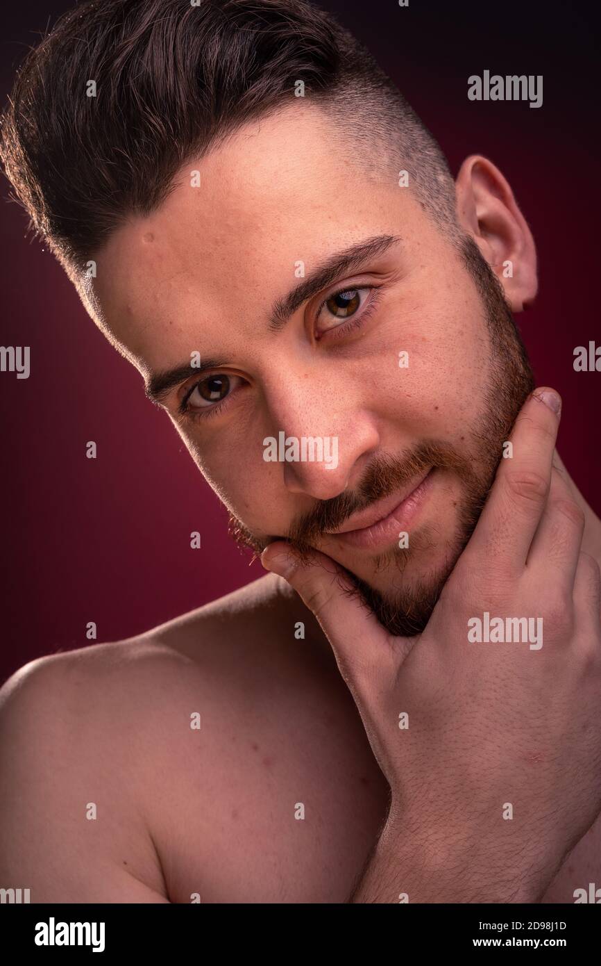 Handsome man posing at a studio Stock Photo
