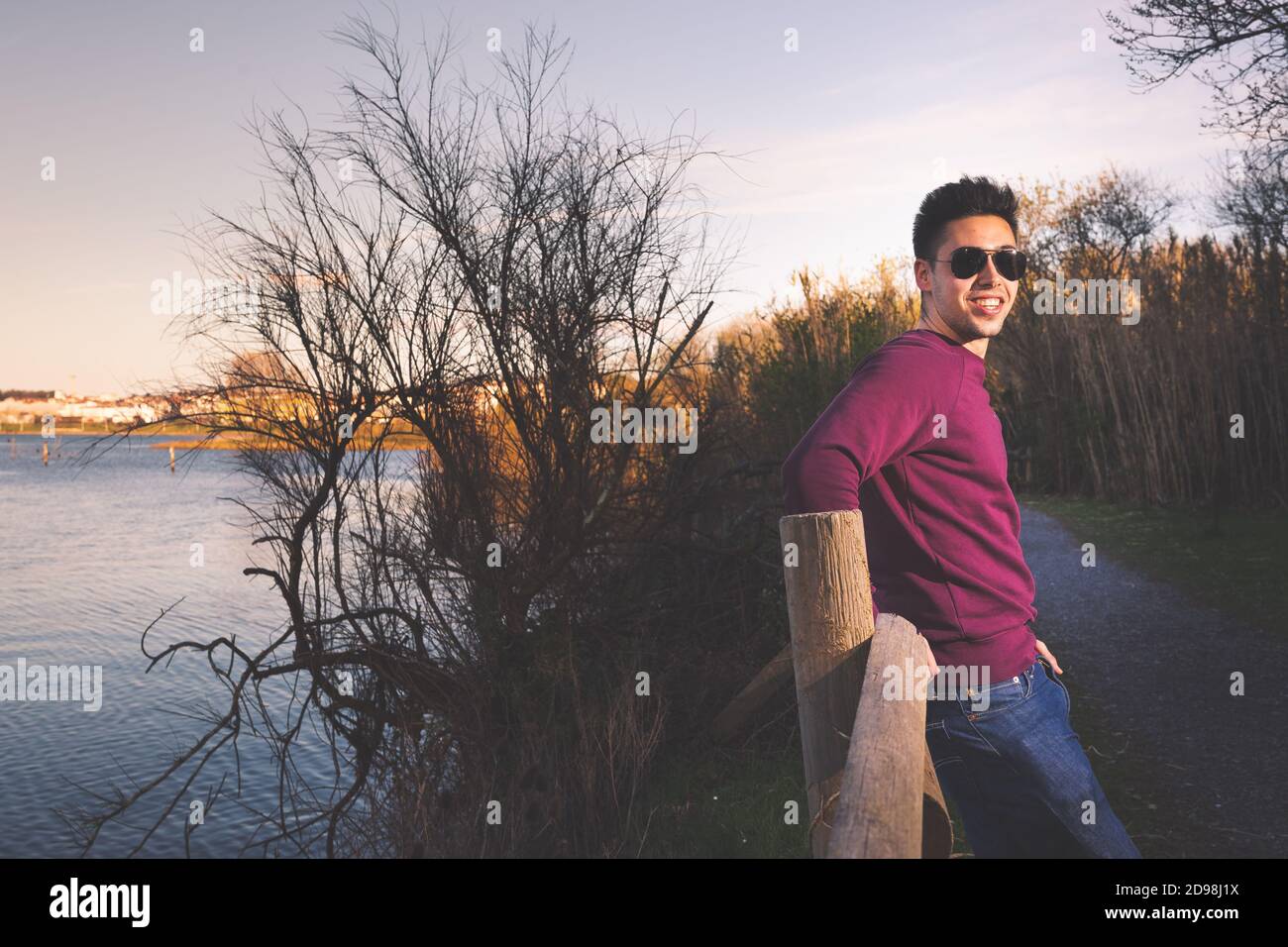 Young man posing at the park. Stock Photo