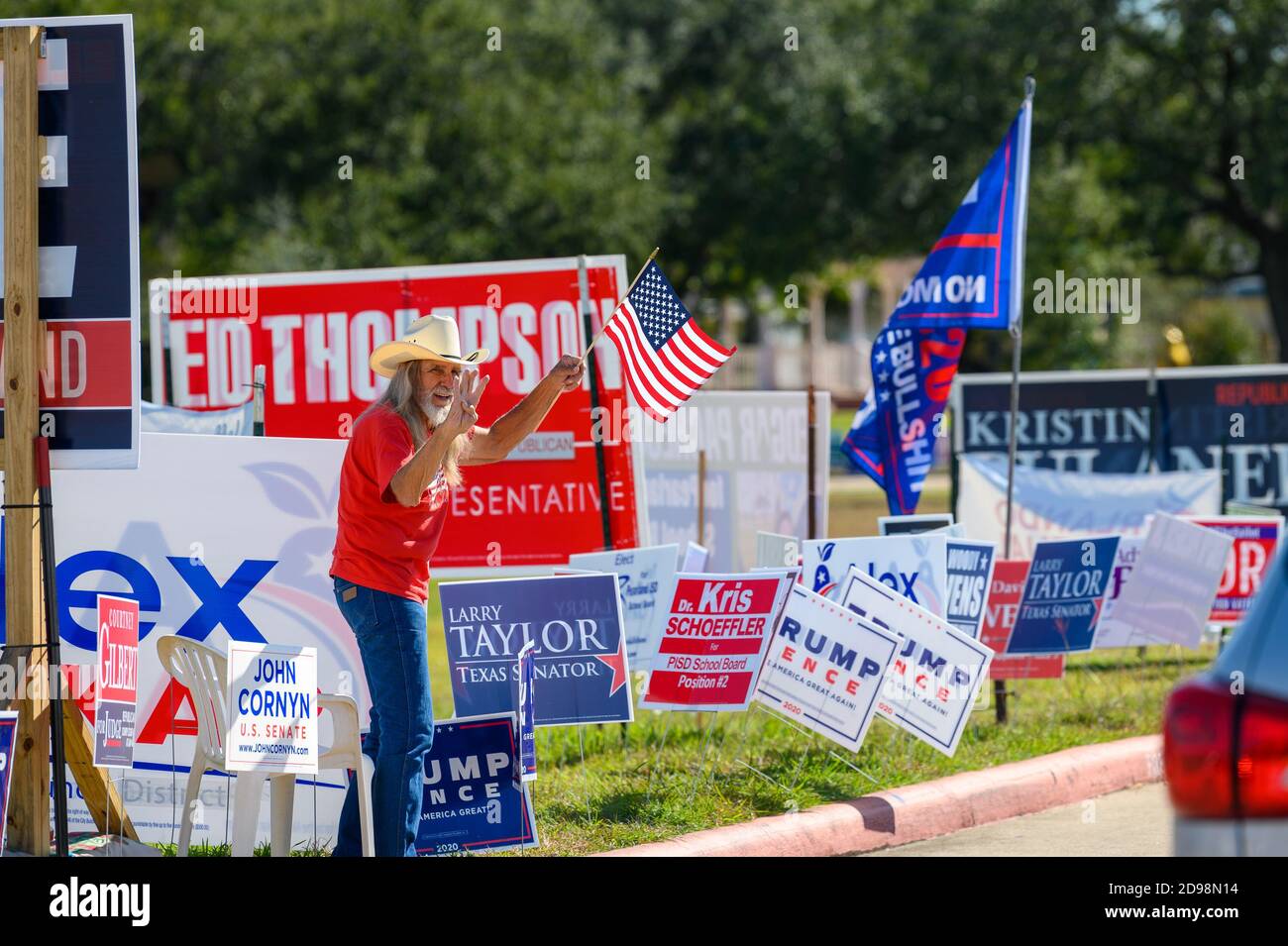 Pearland, Texas, USA. 3rd Nov, 2020. Trump supporter chants “Four more years,” on Nov. 3 outside the polling place in Brazoria County, Pearland, Texas, USA. Credit: Michelmond/Alamy Live News. Stock Photo